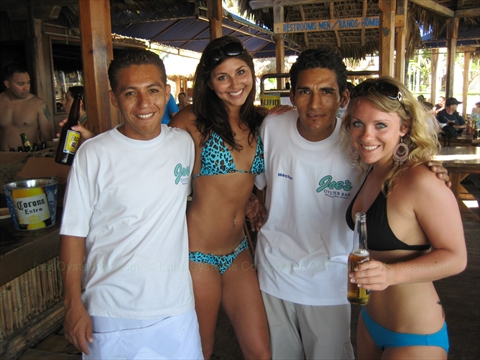 Joe's Oyster Bar staff assisting visitors